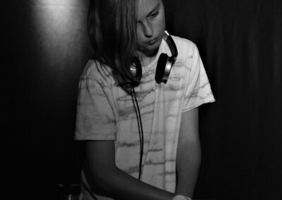 Black and white photo of DJ Kai Nite on stage