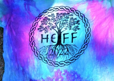 Close up photo of a tie dyed HEFF tshirt